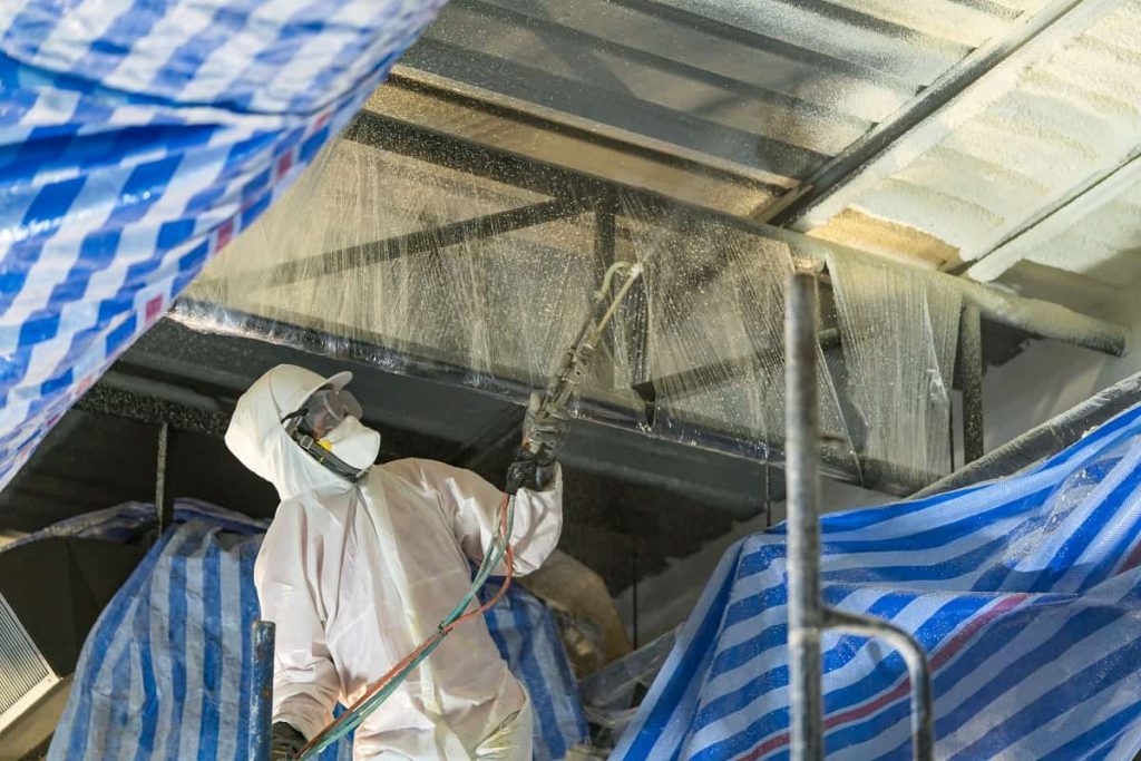 Foam roof repair process for warehouse